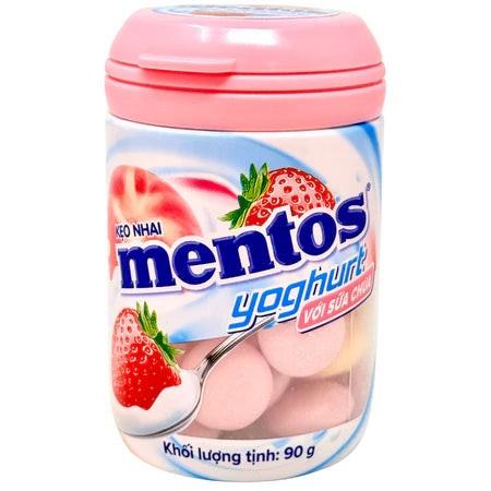 Mentos yoghurt-flavored candy container with pink lid on a white background
